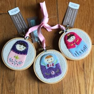 Set of three embroidered ornaments